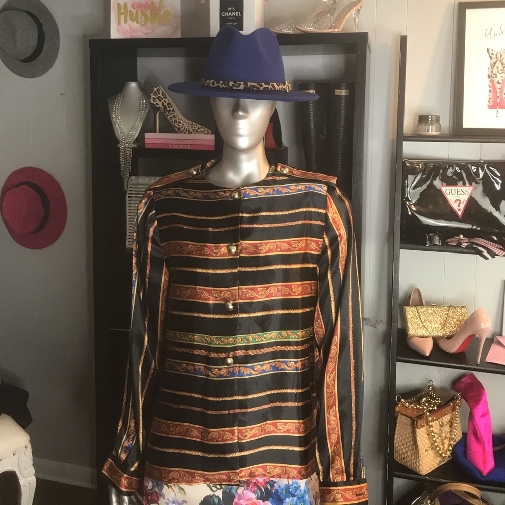 The vintage blouse is a small!